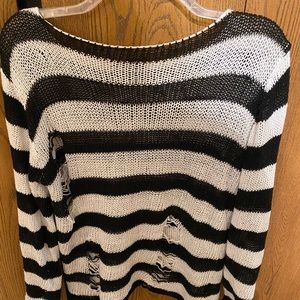 Black and white distressed sweater